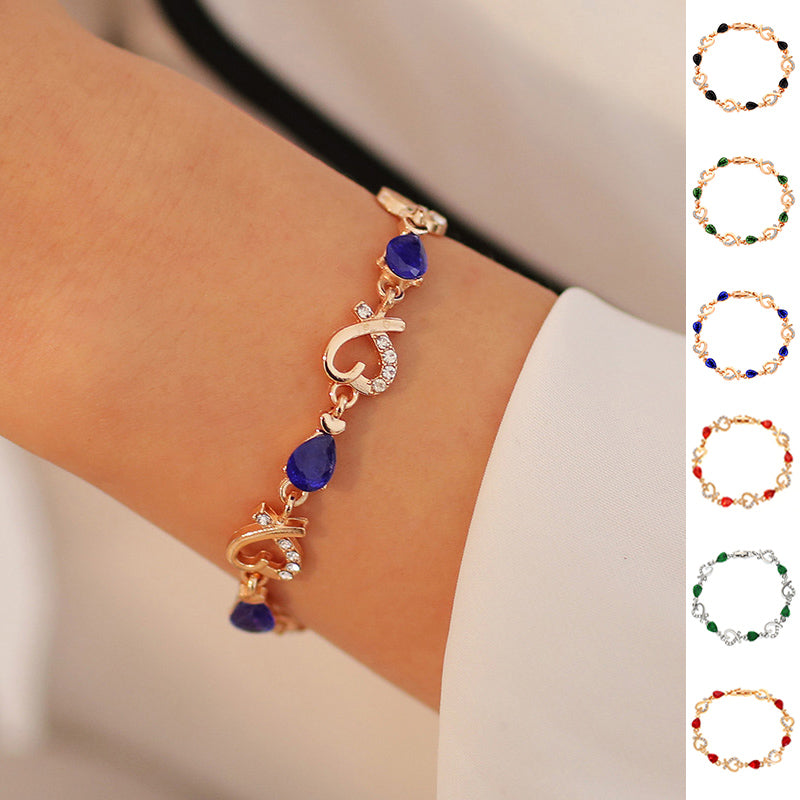 Here’s an optimized and engaging rewrite for your product:  Title Hollow Heart Love Bracelet with Rhinestones - Elegant Valentine’s Day Gift Jewelry