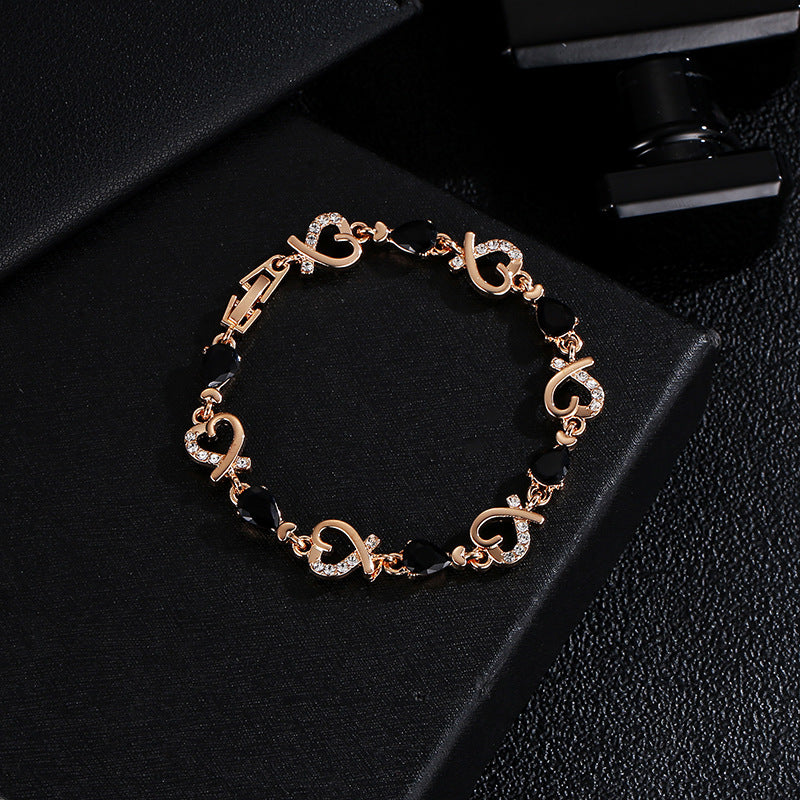 Here’s an optimized and engaging rewrite for your product:  Title Hollow Heart Love Bracelet with Rhinestones - Elegant Valentine’s Day Gift Jewelry